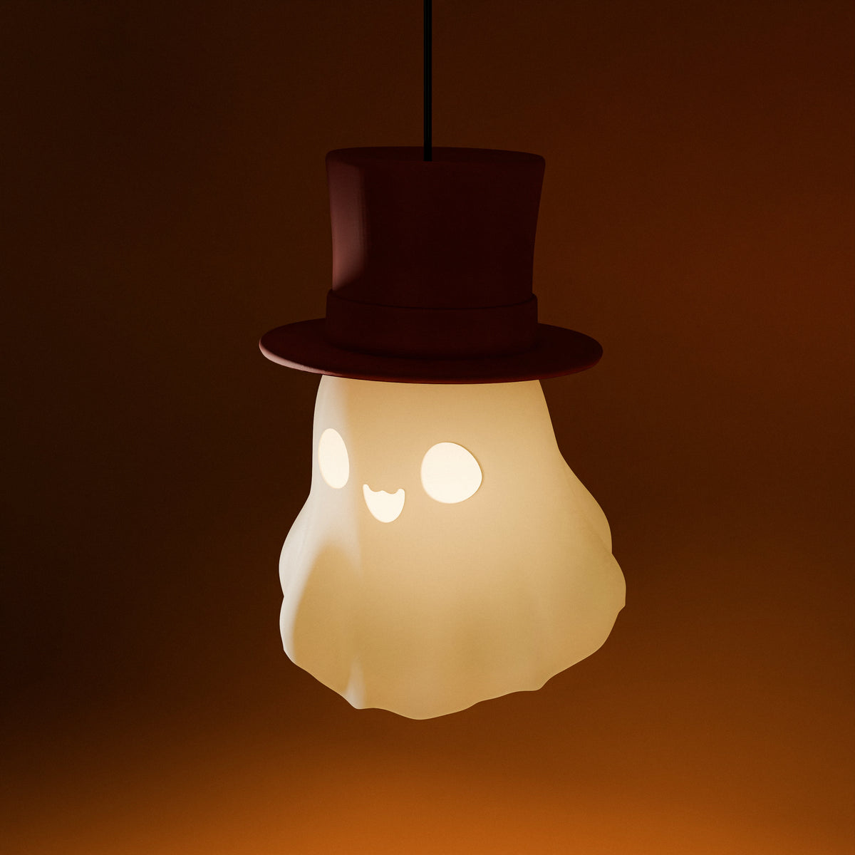 Happy ghost hanging lamp with maroon top hat, lit and glowing