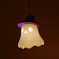 Spooky ghost hanging lamp with purple witch hat, lit and glowing